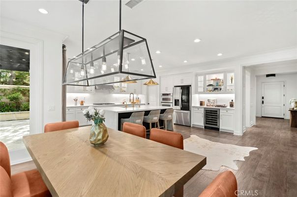Dining room, Interior, Kitchen, Pendant Lights, Recessed Lighting, Stainless Steel Appliances, Wood Texture Flooring
