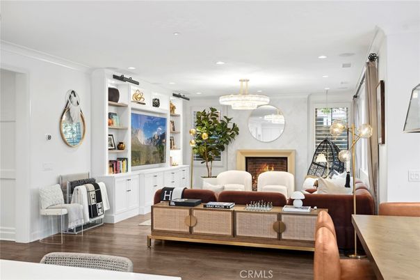 Chandelier, Fireplace, Interior, Living room, Pendant Lights, Recessed Lighting, Wood Texture Flooring