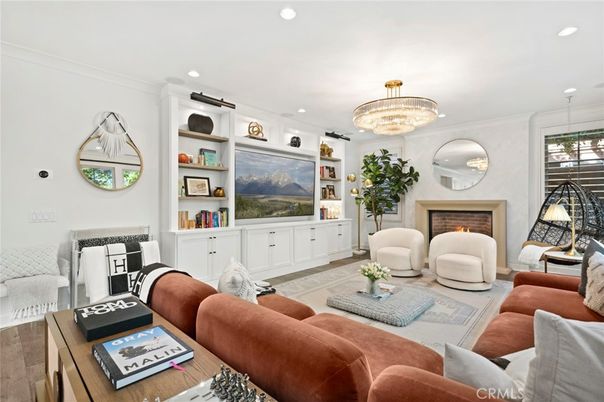 Chandelier, Fireplace, Interior, Living room, Recessed Lighting, Wood Texture Flooring