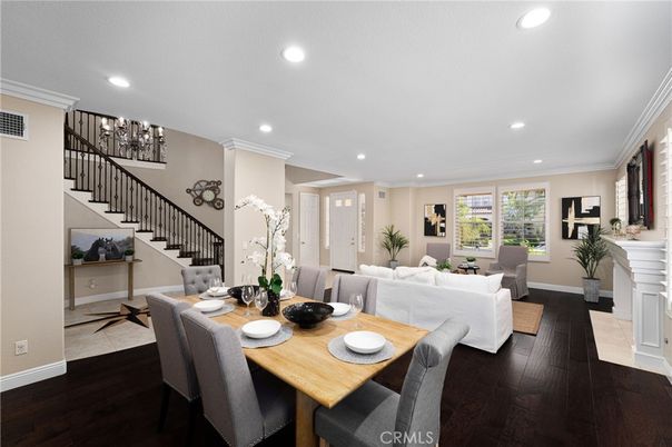 Dining room, Fireplace, Interior, Living room, Recessed Lighting, Wood Texture Flooring