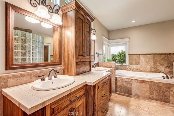 Bathroom, Dual Sink Vanities, Interior, Recessed Lighting, Tile Countertops