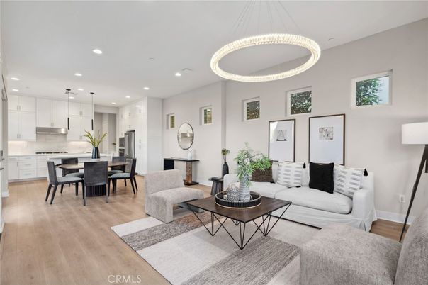 Dining room, Interior, Kitchen, Living room, Pendant Lights, Recessed Lighting, Stainless Steel Appliances, Wood Texture Flooring