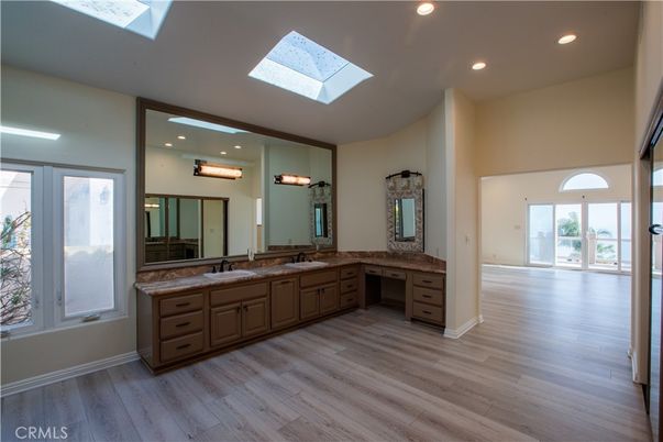 Bathroom, Dual Sink Vanities, Interior, Recessed Lighting, Wood Texture Flooring