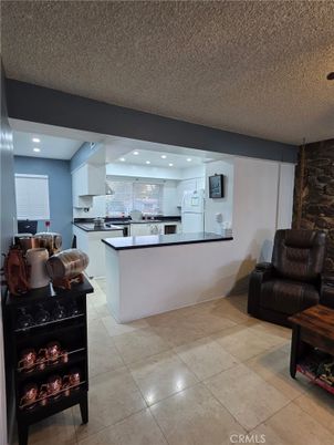 Interior, Kitchen, Living room, Recessed Lighting, Stainless Steel Appliances, Stone Walls
