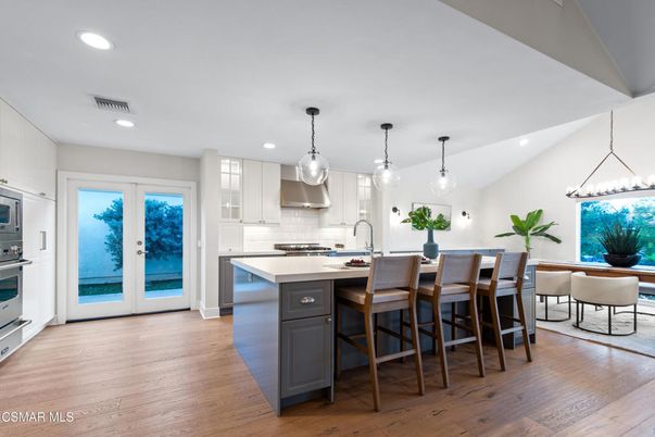 Dining room, Interior, Kitchen, Pendant Lights, Recessed Lighting, Stainless Steel Appliances, Wood Texture Flooring