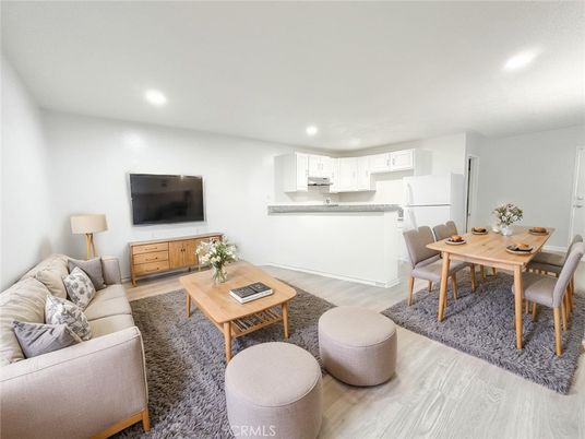 Dining room, Interior, Kitchen, Living room, Recessed Lighting, Stainless Steel Appliances, Wood Texture Flooring