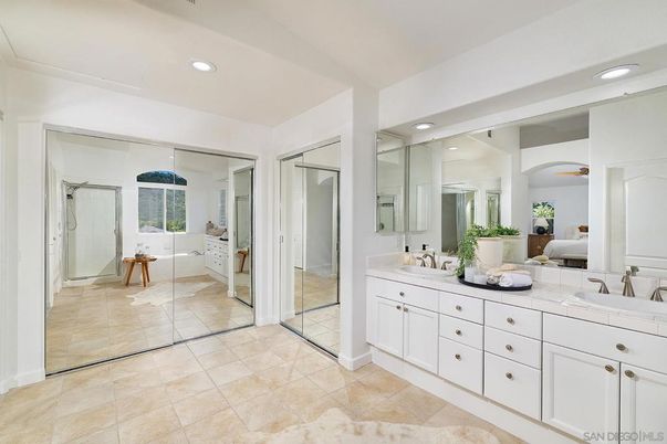 Bathroom, Dual Sink Vanities, Glass Shower, Interior, Recessed Lighting, Tile Countertops