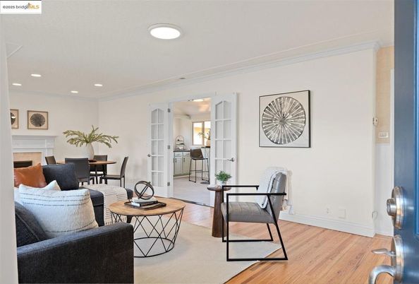 Dining room, Fireplace, Interior, Living room, Recessed Lighting, Wood Texture Flooring