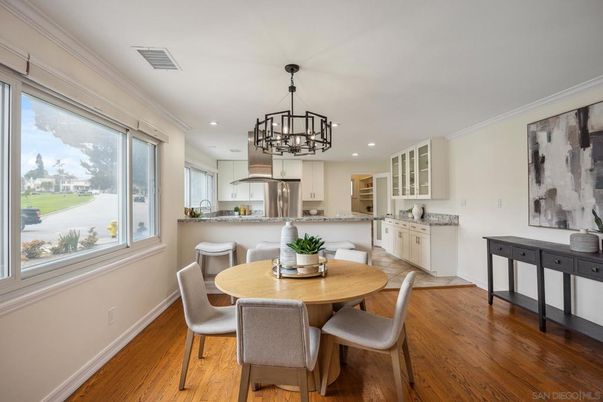 Chandelier, Dining room, Interior, Kitchen, Recessed Lighting, Stainless Steel Appliances, Wood Texture Flooring