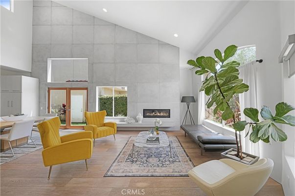 Dining room, Fireplace, Interior, Living room, Recessed Lighting, Wood Texture Flooring