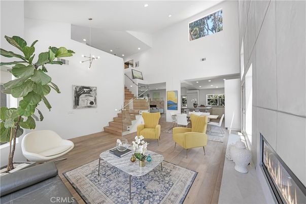Dining room, Fireplace, Interior, Living room, Pendant Lights, Recessed Lighting, Wood Texture Flooring