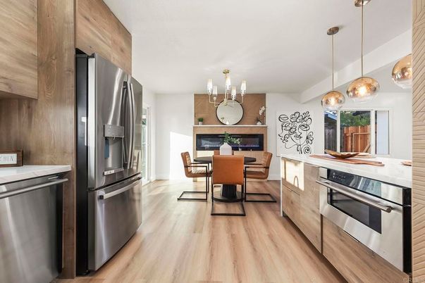 Dining room, Interior, Kitchen, Pendant Lights, Stainless Steel Appliances, Wood Texture Flooring