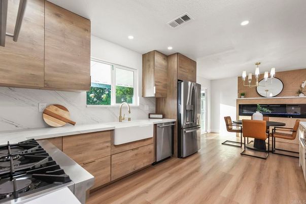 Dining room, Interior, Kitchen, Recessed Lighting, Stainless Steel Appliances, Wood Texture Flooring