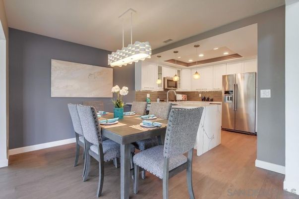 Dining room, Interior, Kitchen, Pendant Lights, Recessed Lighting, Stainless Steel Appliances, Wood Texture Flooring