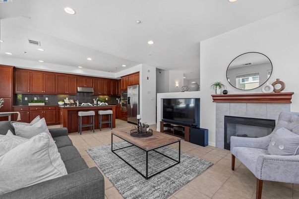 Fireplace, Interior, Kitchen, Living room, Recessed Lighting, Stainless Steel Appliances