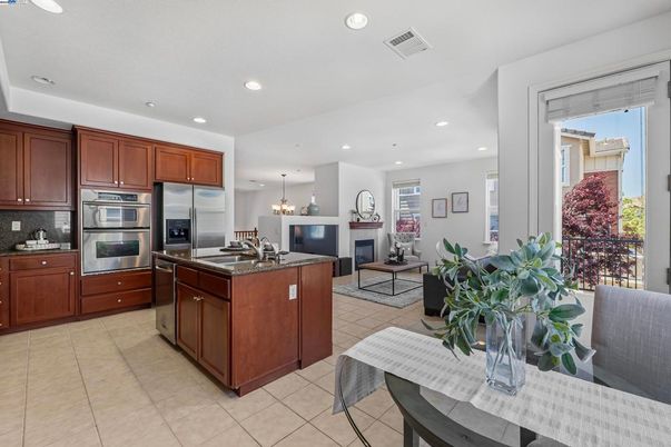Dining room, Fireplace, Interior, Kitchen, Living room, Pendant Lights, Recessed Lighting, Stainless Steel Appliances
