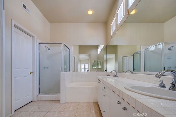 Bathroom, Dual Sink Vanities, Glass Shower, Interior, Recessed Lighting, Tile Countertops