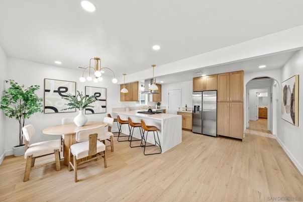 Dining room, Interior, Kitchen, Pendant Lights, Recessed Lighting, Stainless Steel Appliances, Wood Texture Flooring
