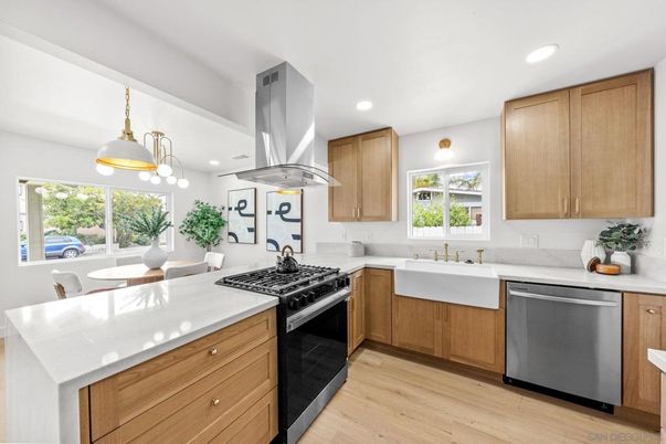 Dining room, Interior, Kitchen, Pendant Lights, Recessed Lighting, Stainless Steel Appliances, Wood Texture Flooring