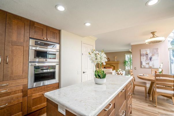 Dining room, Interior, Kitchen, Recessed Lighting, Stainless Steel Appliances, Wood Texture Flooring