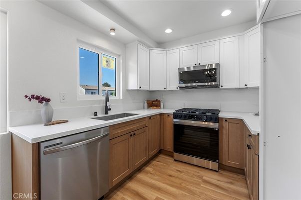 Interior, Kitchen, Recessed Lighting, Stainless Steel Appliances, Wood Texture Flooring