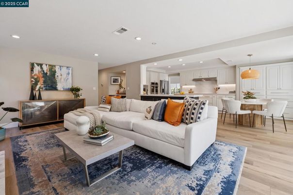 Dining room, Interior, Kitchen, Living room, Pendant Lights, Recessed Lighting, Stainless Steel Appliances, Wood Texture Flooring
