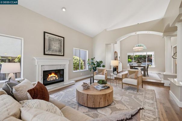 Dining room, Fireplace, Interior, Living room, Pendant Lights, Recessed Lighting, Wood Texture Flooring