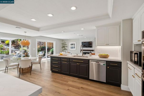Dining room, Interior, Kitchen, Pendant Lights, Recessed Lighting, Stainless Steel Appliances, Wood Texture Flooring
