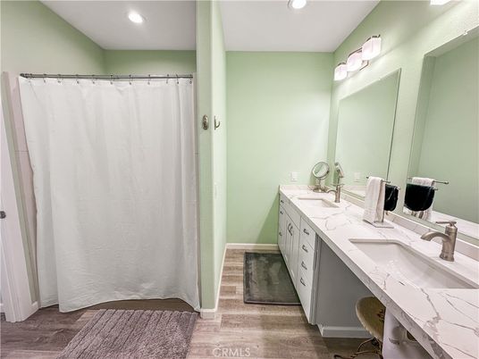 Bathroom, Dual Sink Vanities, Interior, Recessed Lighting, Wood Texture Flooring