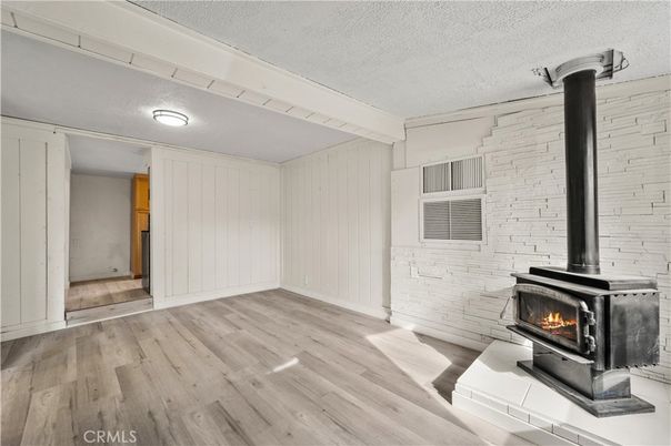Empty room, Fireplace, Interior, Stone Walls, Wood Texture Flooring