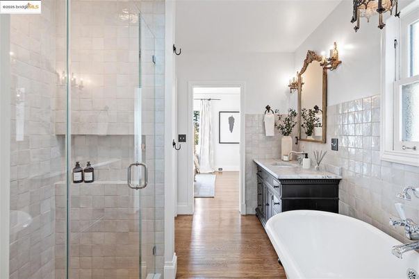 Bathroom, Dual Sink Vanities, Free Standing Baths, Glass Shower, Interior, Wood Texture Flooring