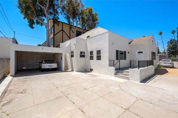 Attached, Exterior, Facade, Spanish Mediterranean