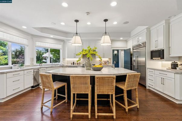 Interior, Kitchen, Pendant Lights, Recessed Lighting, Stainless Steel Appliances, Wood Texture Flooring