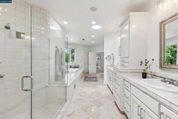 Bathroom, Dual Sink Vanities, Glass Shower, Interior, Recessed Lighting, Tile Countertops
