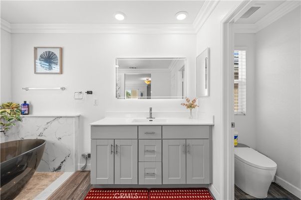 Bathroom, Dual Sink Vanities, Interior, Marble Walls, Recessed Lighting