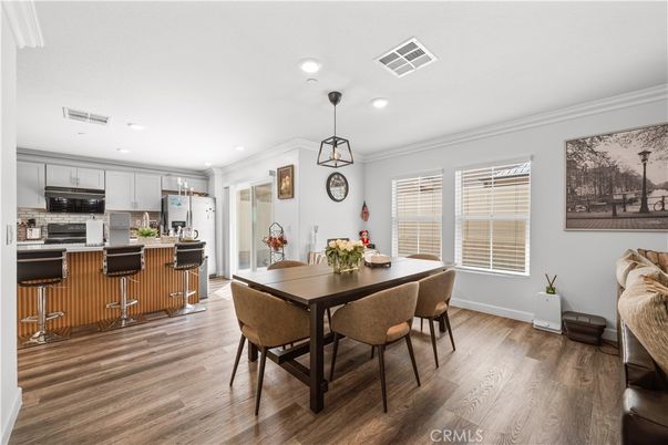 Dining room, Interior, Kitchen, Pendant Lights, Recessed Lighting, Stainless Steel Appliances, Wood Texture Flooring