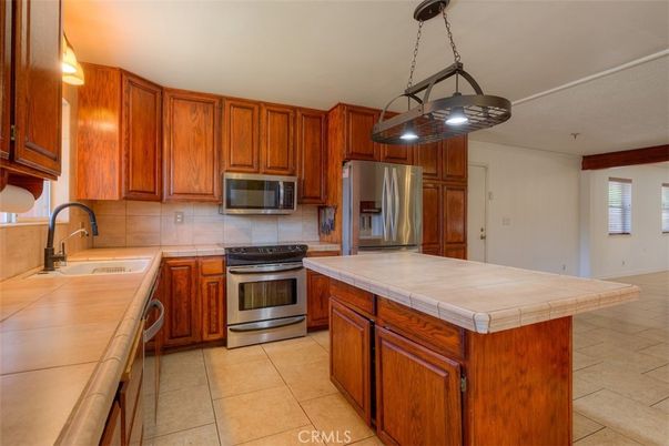 Interior, Kitchen, Pendant Lights, Stainless Steel Appliances, Tile Countertops