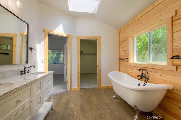 Bathroom, Dual Sink Vanities, Free Standing Baths, Interior, Wood Texture Flooring, Wooden Walls