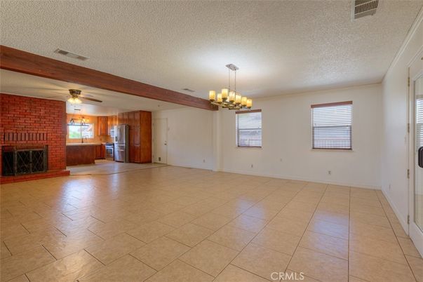 Chandelier, Empty room, Fireplace, Interior, Kitchen, Stone Walls, Wooden Beams