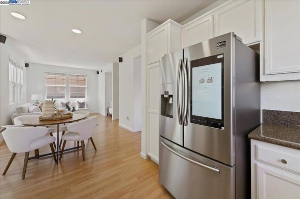 Dining room, Interior, Kitchen, Recessed Lighting, Stainless Steel Appliances, Wood Texture Flooring