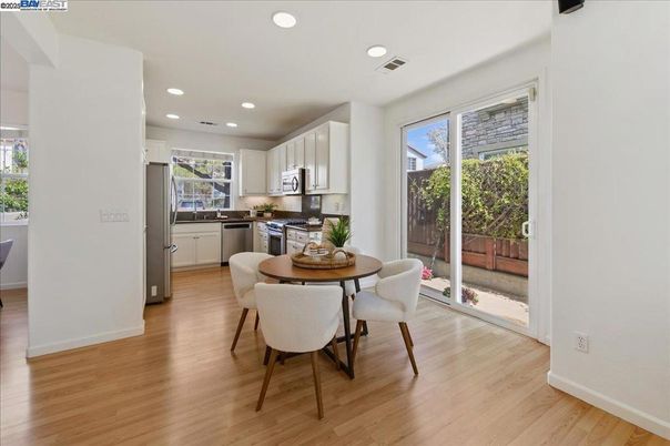 Dining room, Interior, Kitchen, Recessed Lighting, Stainless Steel Appliances, Wood Texture Flooring