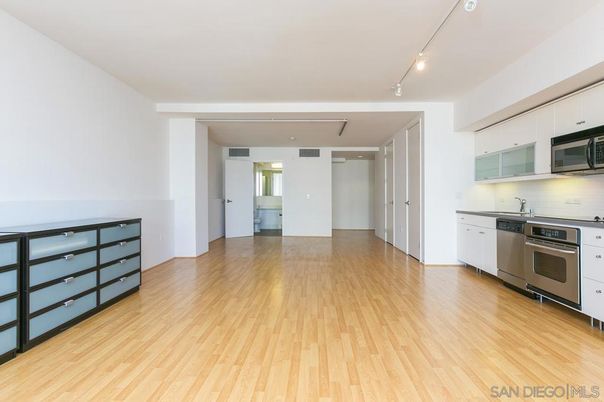Empty room, Interior, Kitchen, Stainless Steel Appliances, Wood Texture Flooring