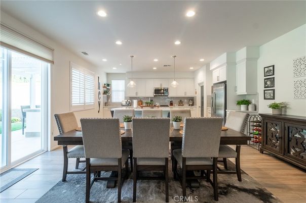 Dining room, Interior, Kitchen, Pendant Lights, Recessed Lighting, Stainless Steel Appliances, Wood Texture Flooring
