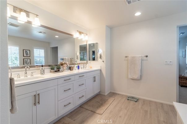 Bathroom, Dual Sink Vanities, Interior, Recessed Lighting, Wood Texture Flooring