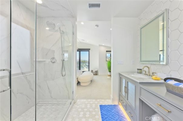 Bathroom, Dual Sink Vanities, Glass Shower, Interior, Marble Walls, Recessed Lighting