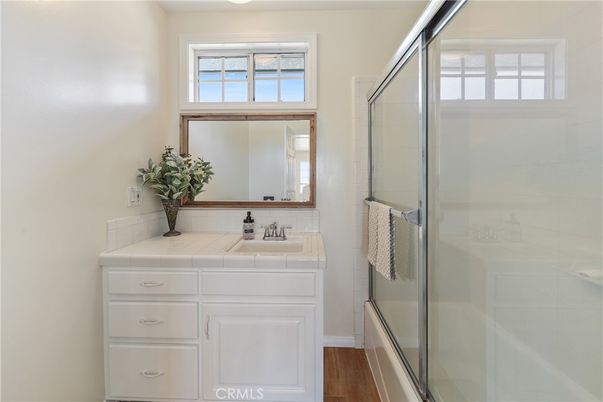 Bathroom, Glass Shower, Interior, Tile Countertops, Wood Texture Flooring