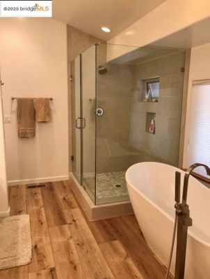Bathroom, Free Standing Baths, Glass Shower, Interior, Recessed Lighting, Wood Texture Flooring