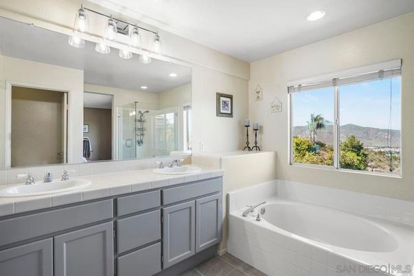 Bathroom, Dual Sink Vanities, Glass Shower, Interior, Recessed Lighting, Tile Countertops