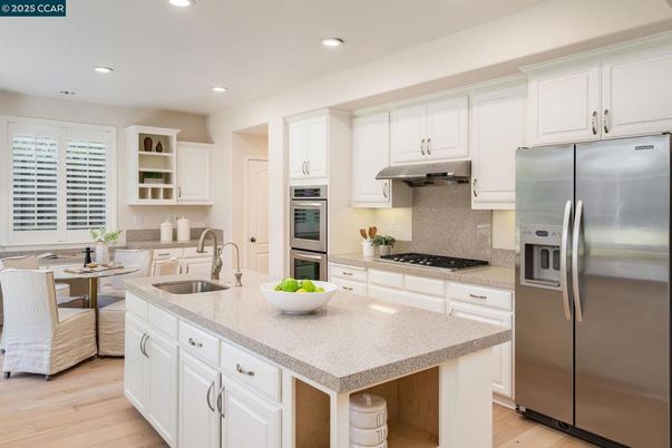 Dining room, Interior, Kitchen, Recessed Lighting, Stainless Steel Appliances, Wood Texture Flooring