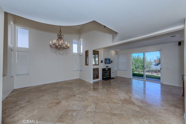 Chandelier, Empty room, Fireplace, Interior